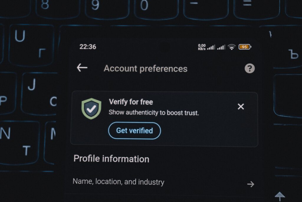 A smartphone screen showing an account verification alert